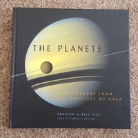 Planets: Photographs from the Archives of NASA - A Review